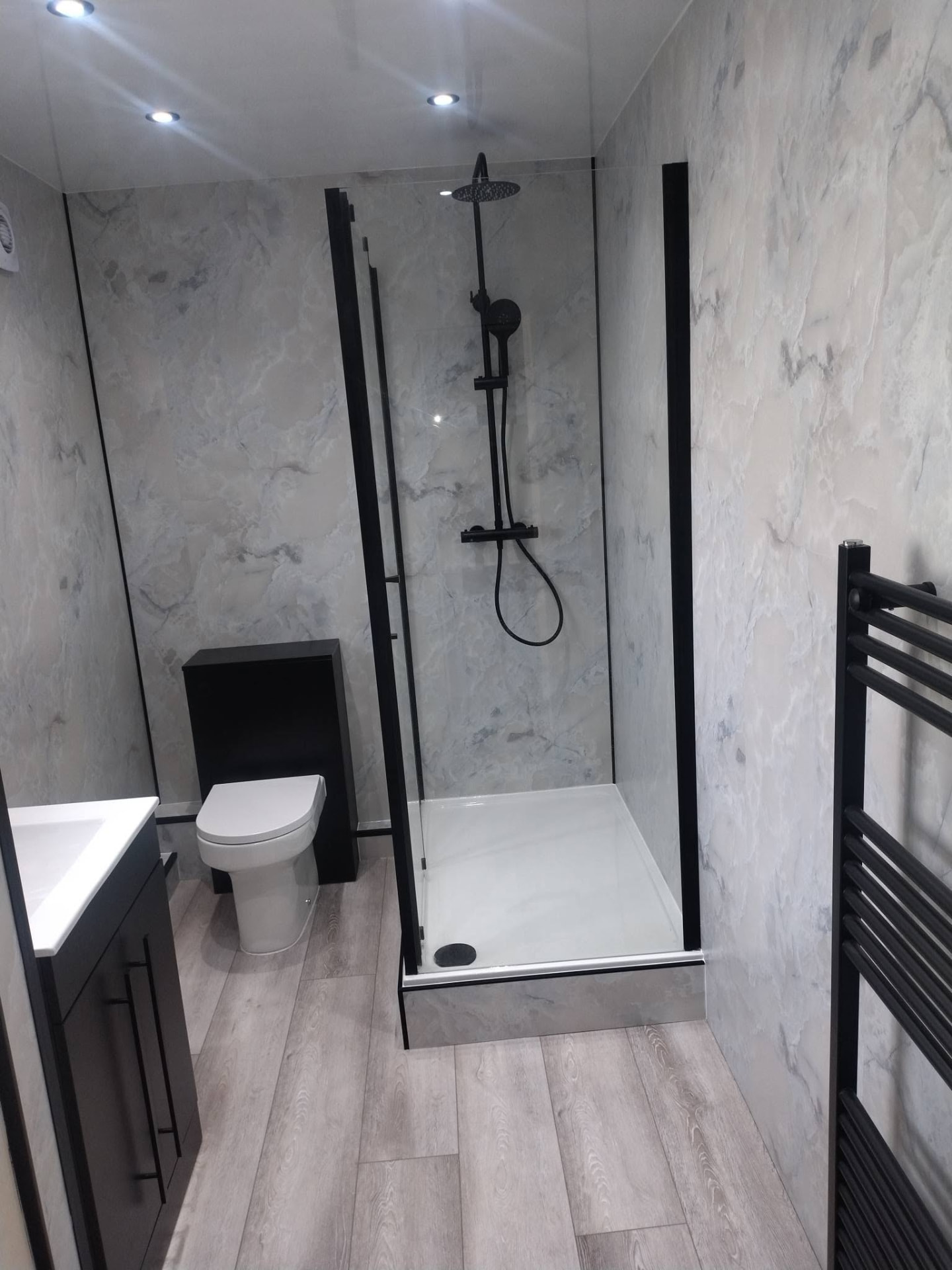 Modern shower room with black fittings